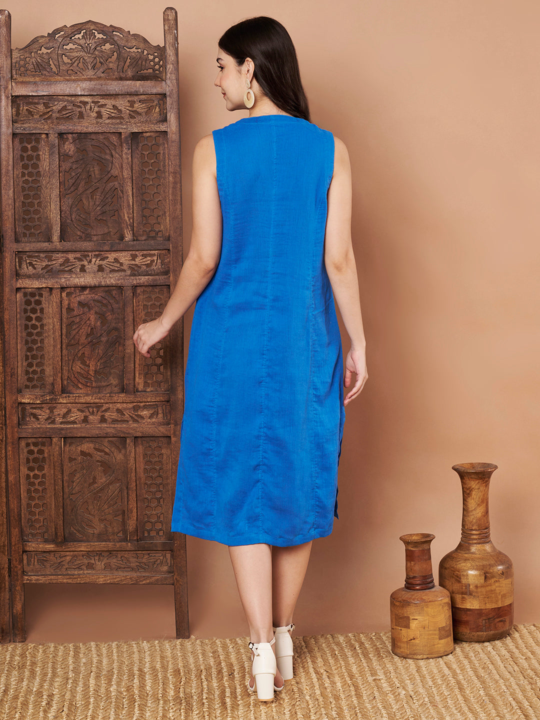 Back view of blue cotton sleeveless button-down dress for women